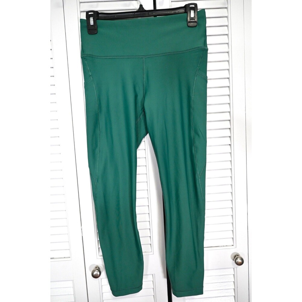 Athleta Interval Stash 7/8 Tight Leggings Green Women’s Size M Pockets